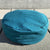 Side view of Shanti Bowl Teal Meditation Cushion